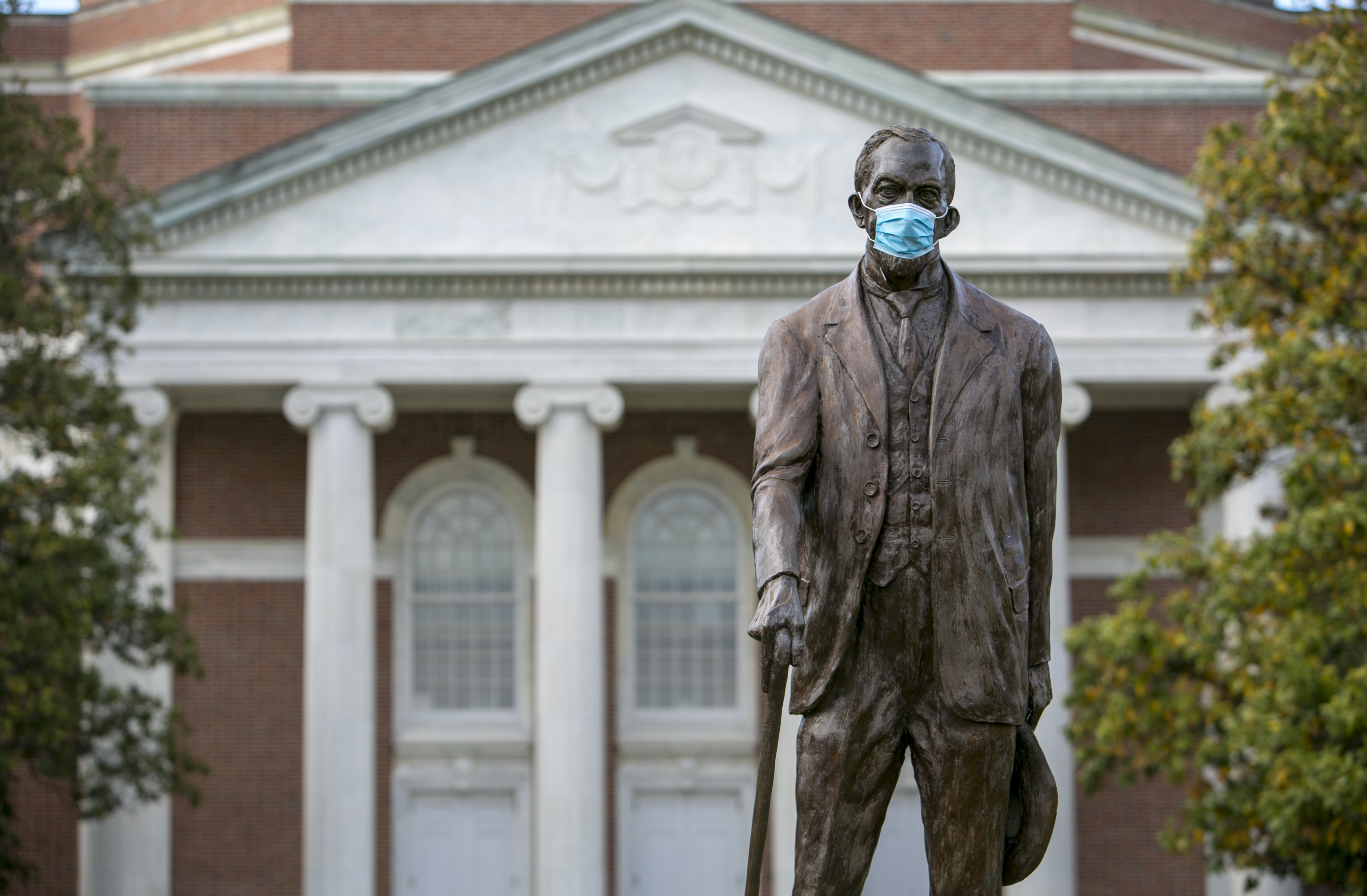 The Benjamin Duke statue wearing a mask.